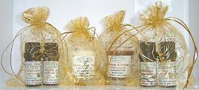  The three wise men Gold organza gift bags,
 with Frankincense and Myrrh, Cinnamon and Orange, essential oils and candles. 